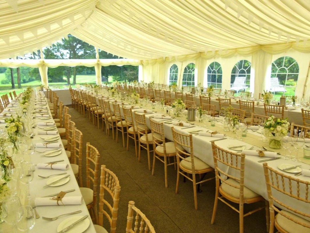One of the many long table arrangements available. www.camelotmarquees.co.uk